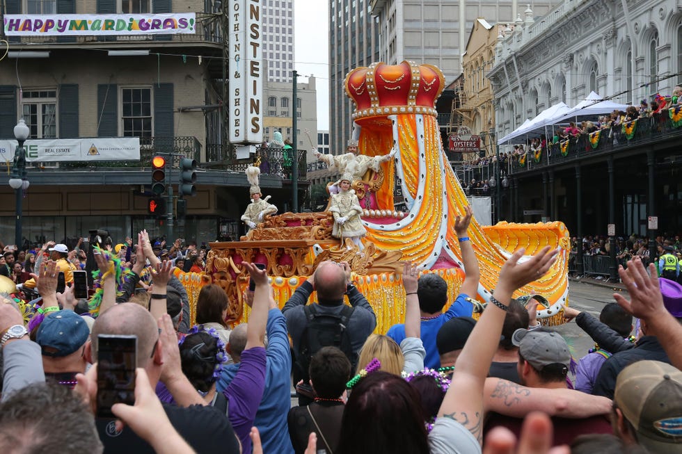 revelers fill the street as new orleans celebrates mardi gras