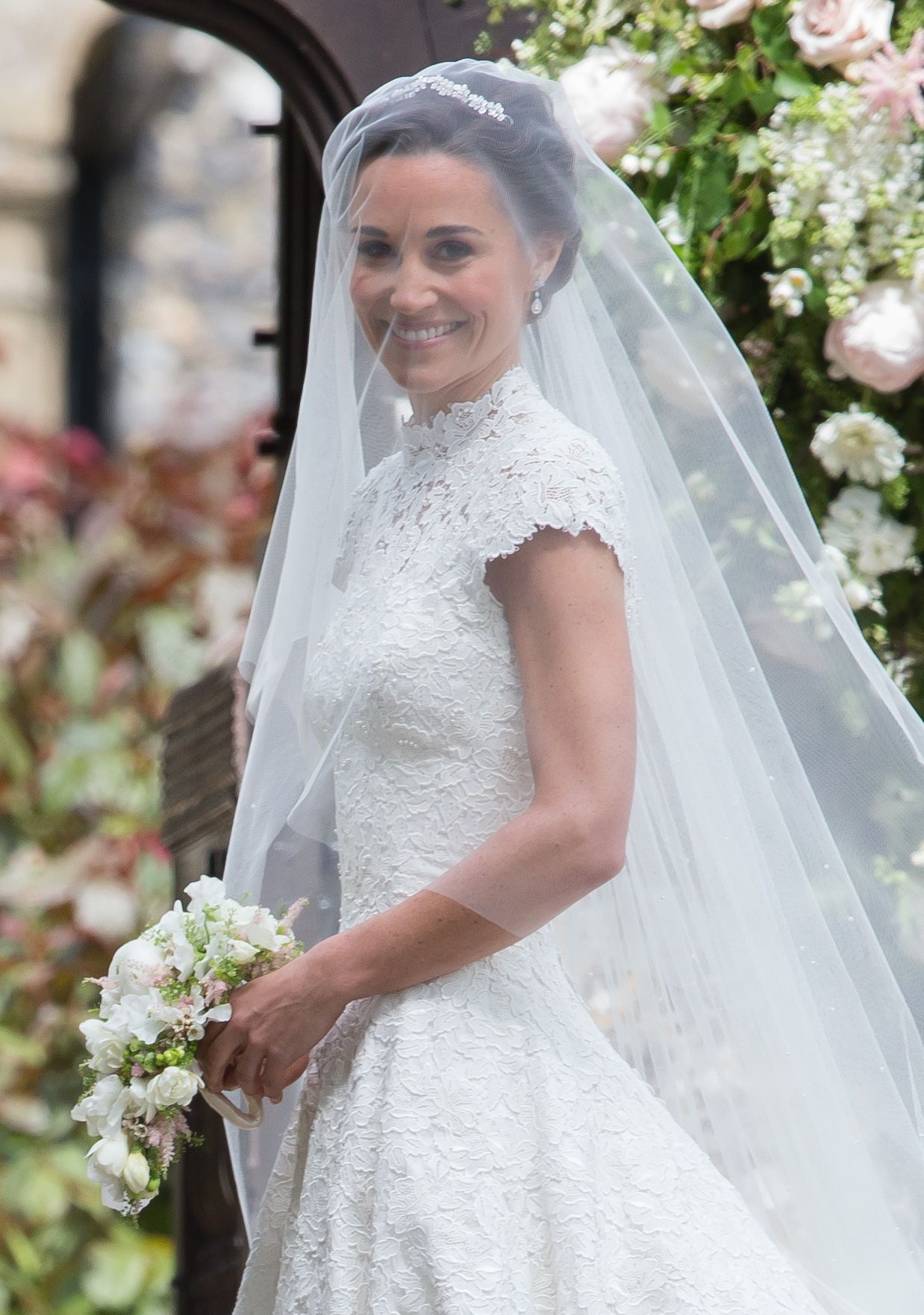 Wedding dress with veil over cheap face