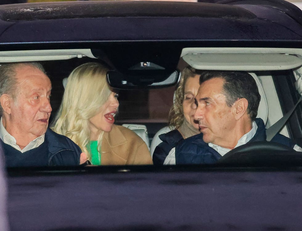 a group of people in a car