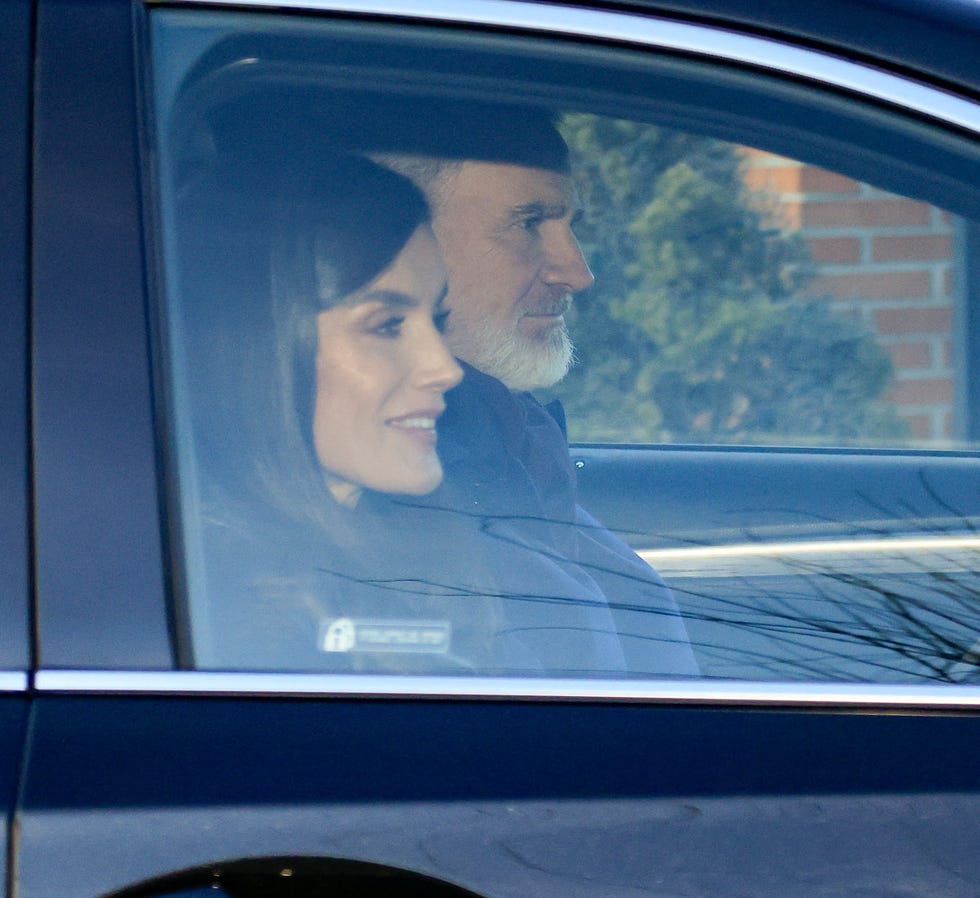 a man and woman in a car