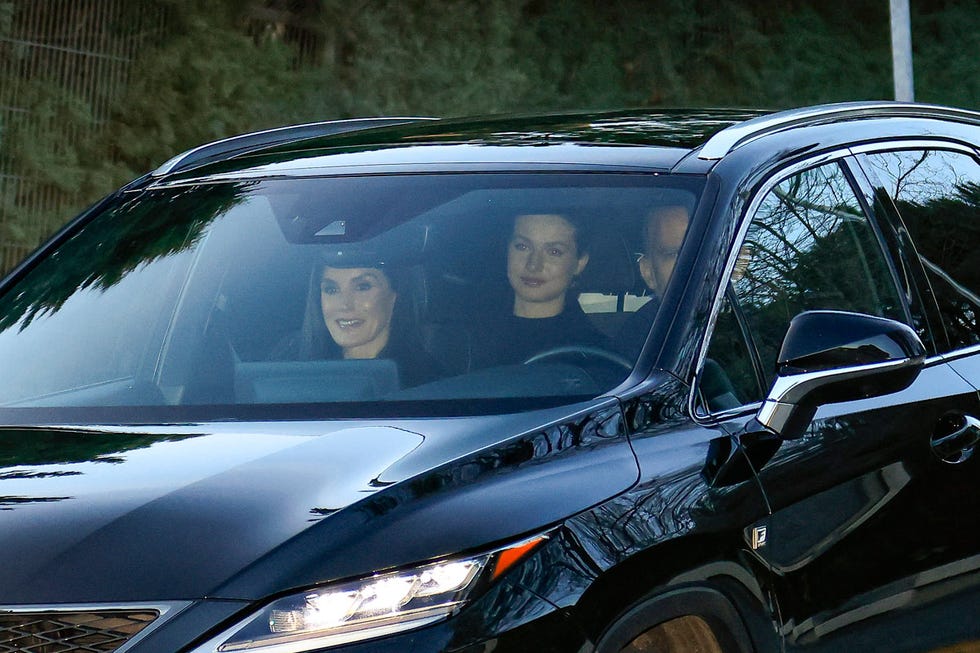 a couple of people in a car