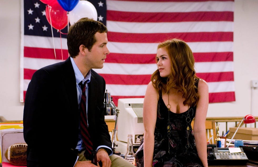 ryan reynolds as will hayes and isla fisher as april ©2007 universal studios
