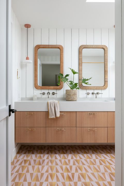 bathroom vanity with 2 mirrors