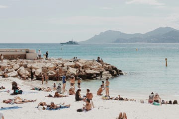 a group of people on a beach