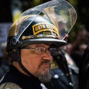 Pro-Donald Trump group holds a rally berkeley, usa april 27, 2017 an oath keeper, brought on to provide security, stands guard during a pro donald trump rally at martin luther king jr civic center park in berkeley, california on april 27, 2017 the rally was held in protest of the cancellation of a planned talk by ann coulter on the campus of the university of california berkeley, amid security concerns photo by philip pachecoanadolu agencygetty images