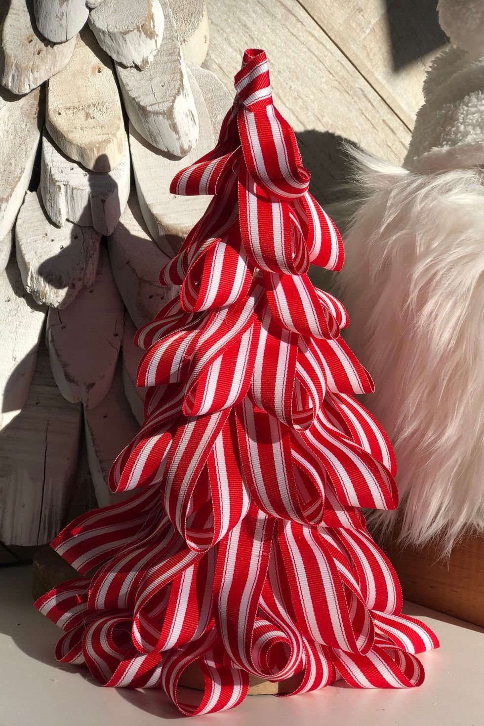 red and white striped ribbon tree
