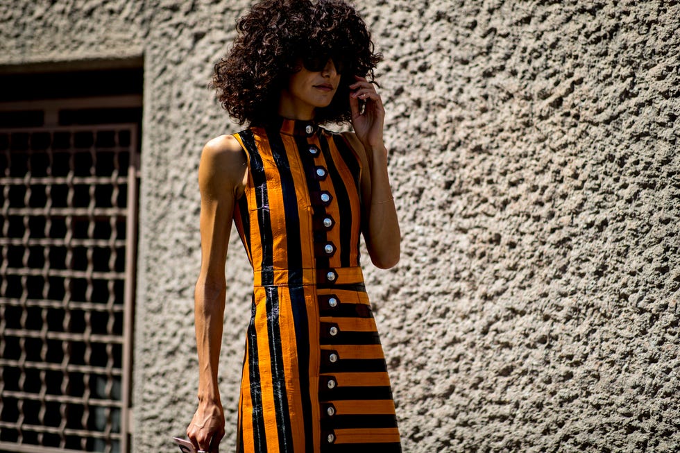 Clothing, Dress, Orange, Fashion, Yellow, Fashion design, Fashion model, Pattern, Photography, Photo shoot, 