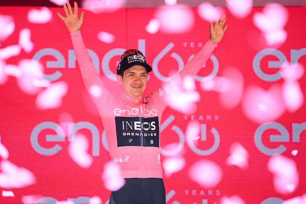 richard carapaz of ecuador and team ineos grenadiers pink leader jersey celebrates at podium during the giro d'italia