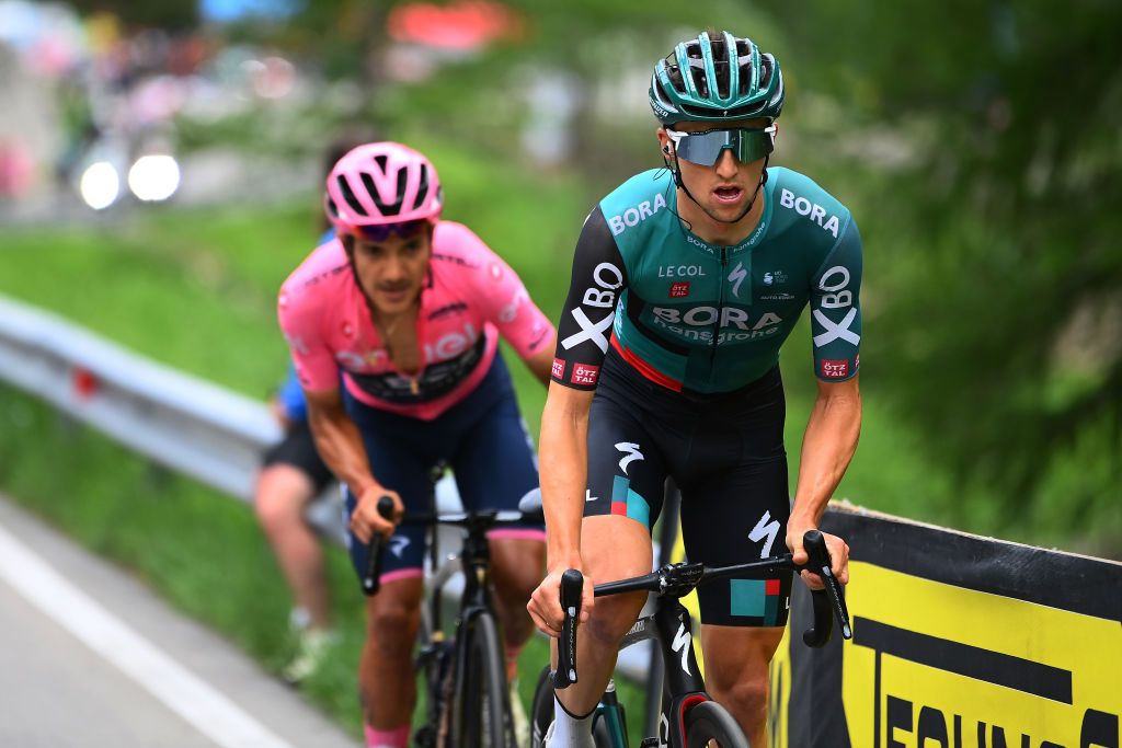 Jai Hindley of Bora-Hansgrohe works to break Richard Carapaz of INEOS Grenadiers on Stage 20 of the Giro d’Italia.