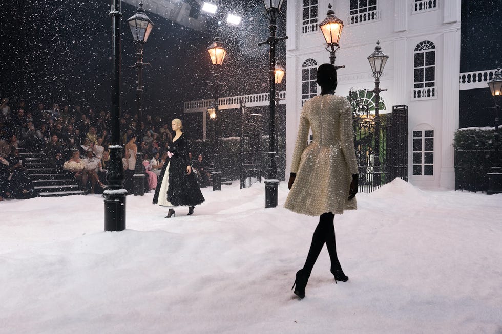 Fashion runway featuring models in winter attire