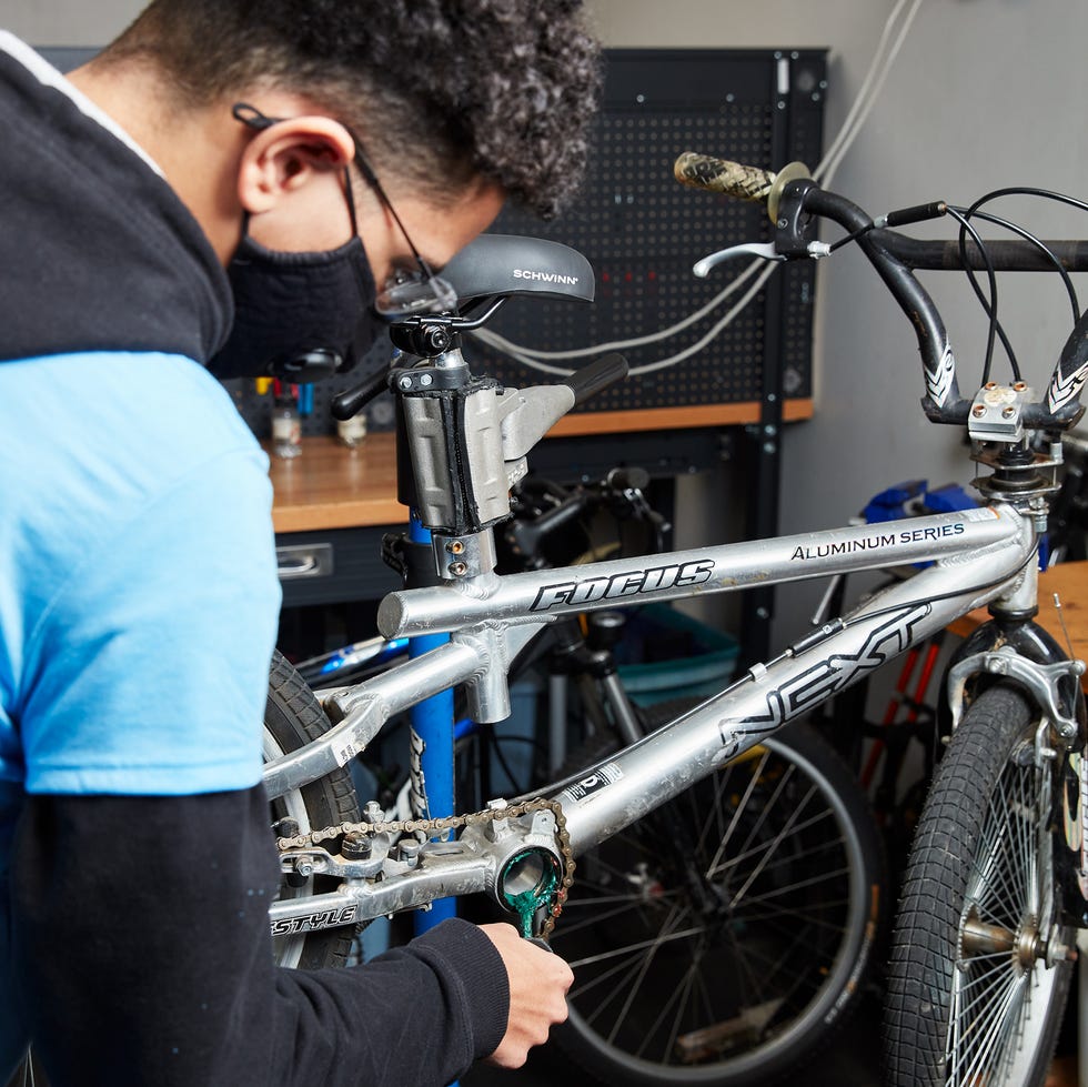 these kids are bike repair wizards