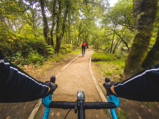 Riding along the cycle path of the Tea river