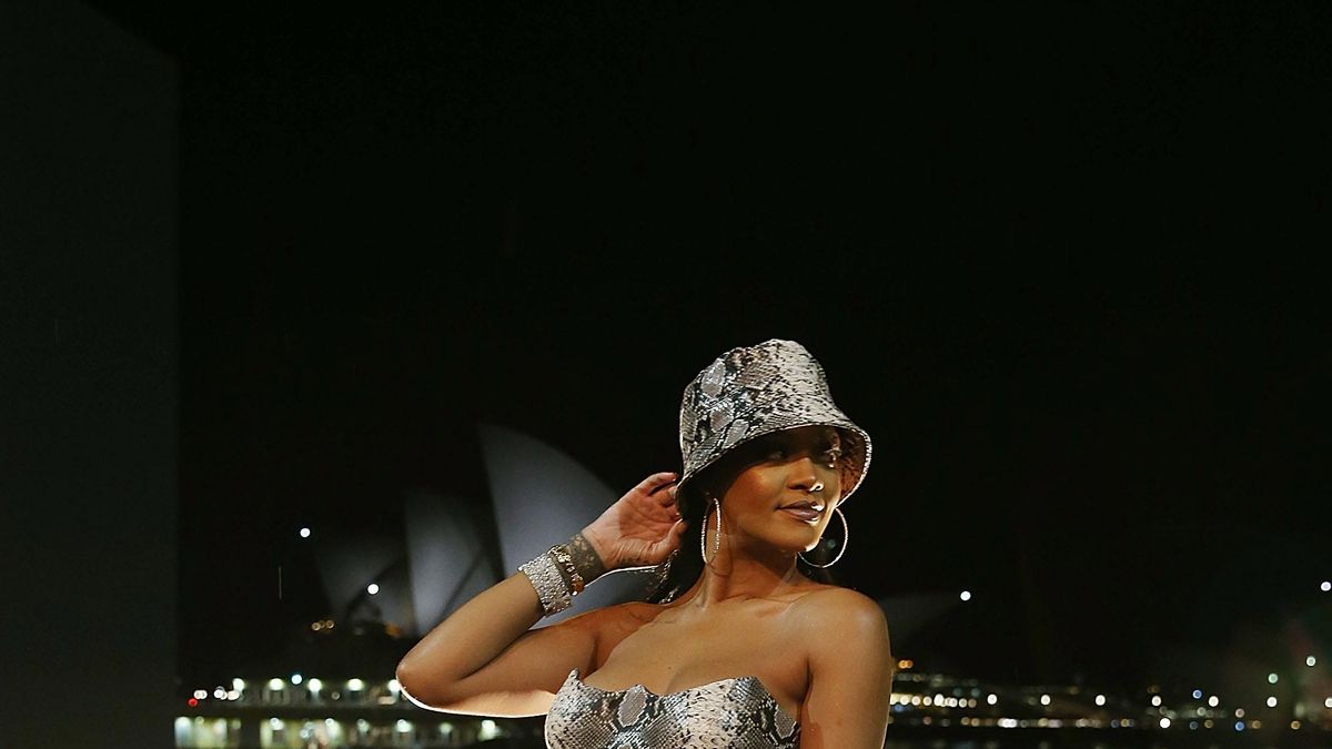 Rihanna wore a matching snakeskin hat and mini dress like only she can