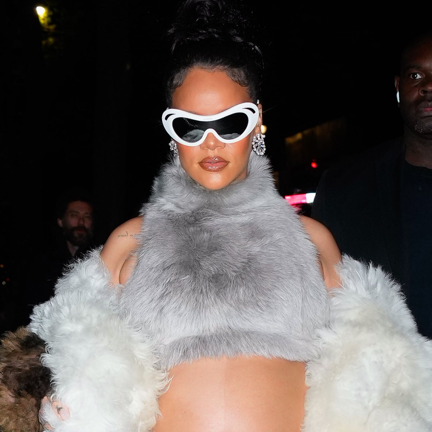 Rihanna Shows Off Baby Bump Under Luxurious Fur Coat