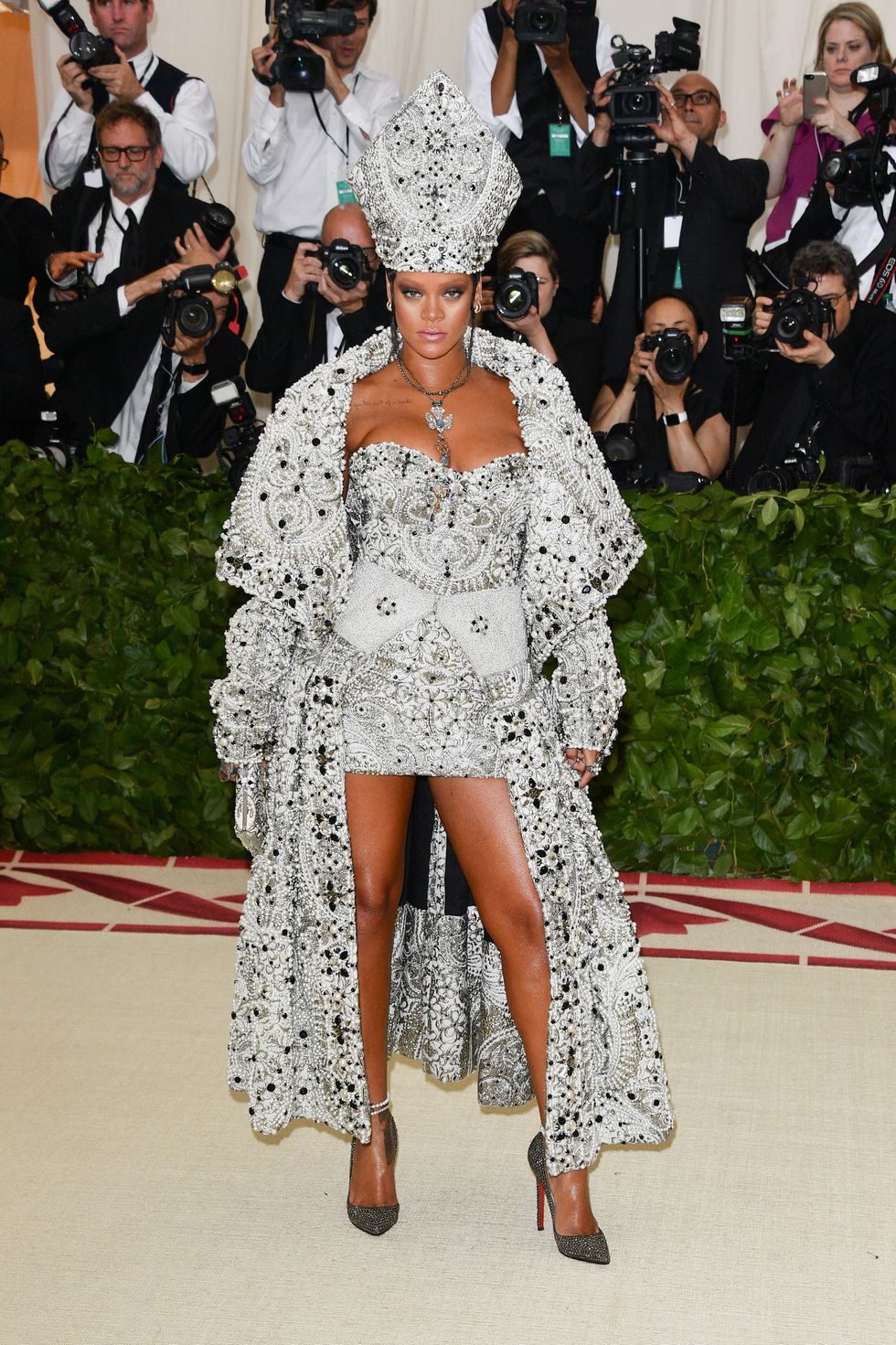 rihanna at the 2018 met gala themed "heavenly bodies fashion and the catholic imagination" costume institute gala