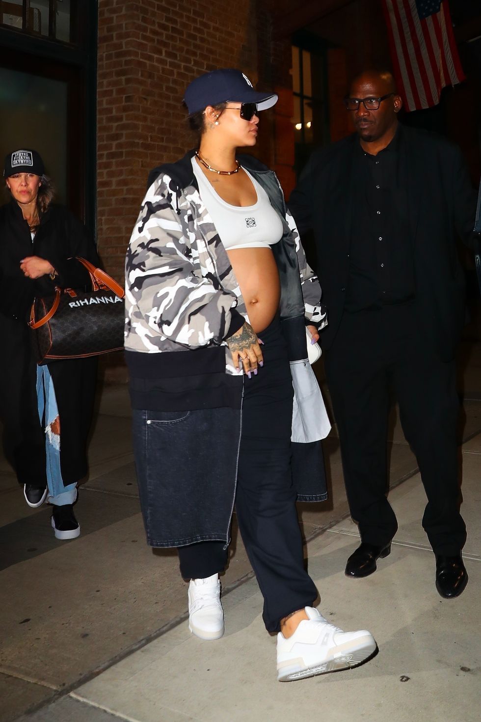 Shows Baby Bump in Crop Sweatpants, and Camo