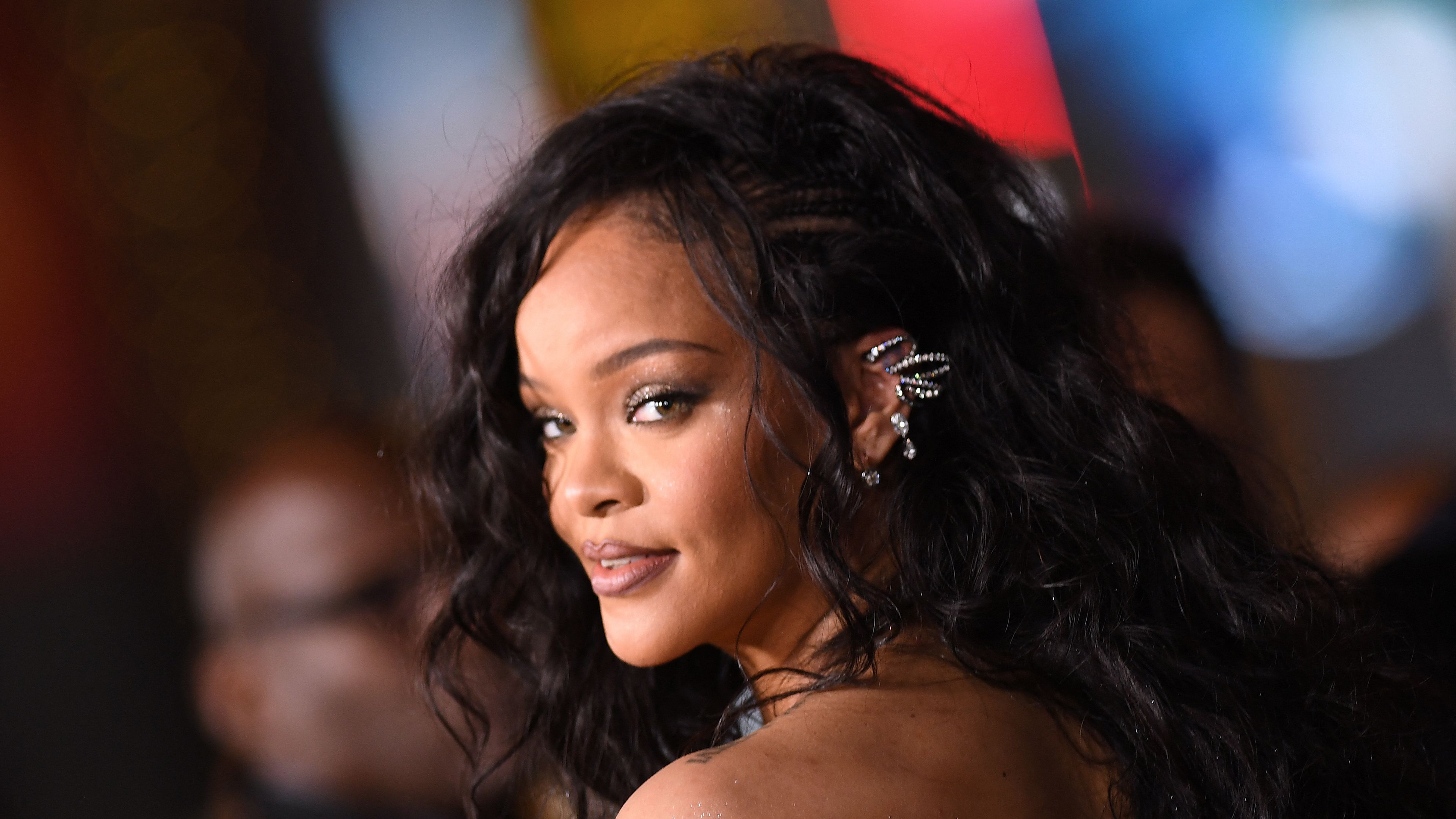 Pregnant Rihanna Bares Her Bump At the Louis Vuitton Menswear Show in 2023