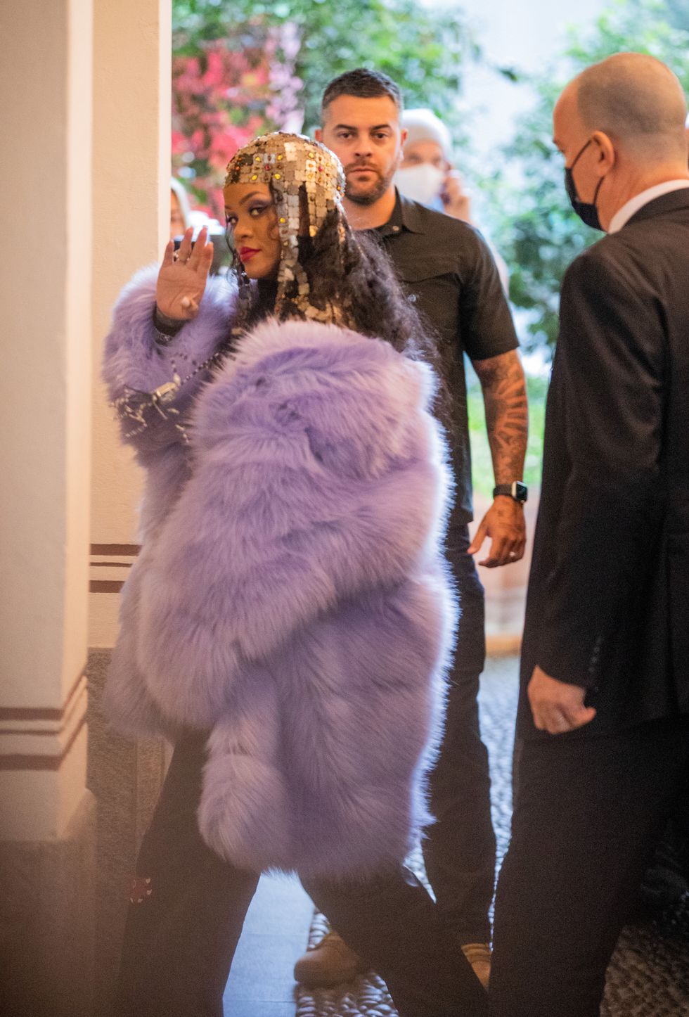 milan, italy   february 25 rihanna is seen wearing golden head piece, pink coat arriving at her hotel after gucci during the milan fashion week fallwinter 20222023 on february 25, 2022 in milan, italy photo by christian vieriggetty images