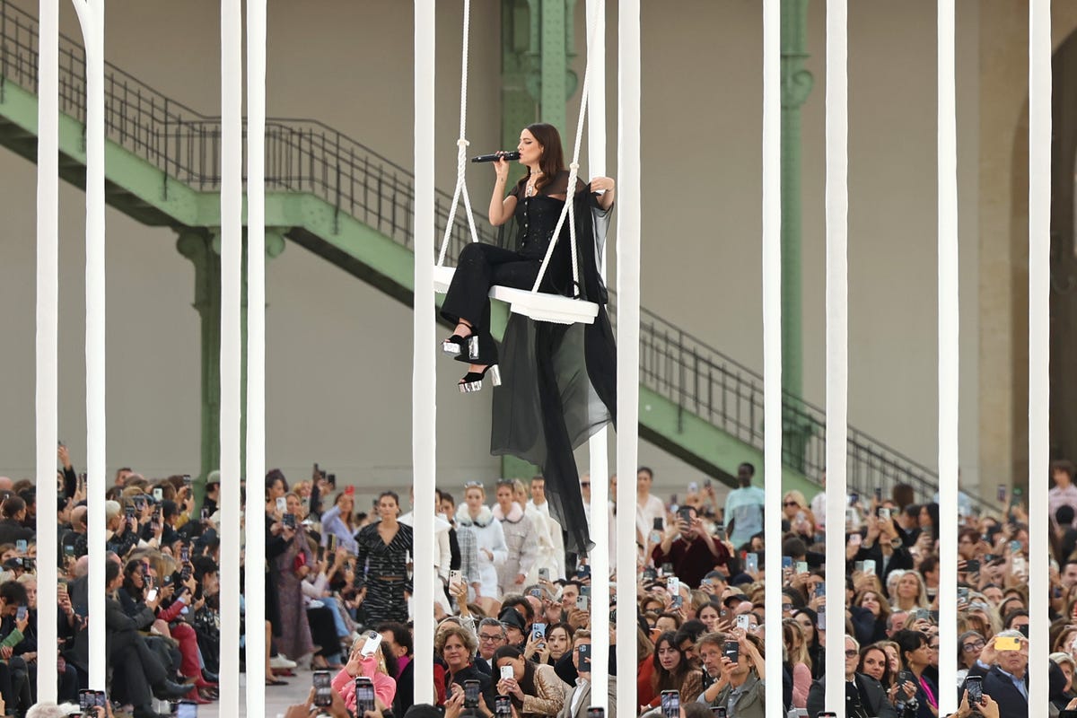 ‘Daisy Jones And The Six Fans’ Rejoice As Riley Keough Sings At Chanel Show