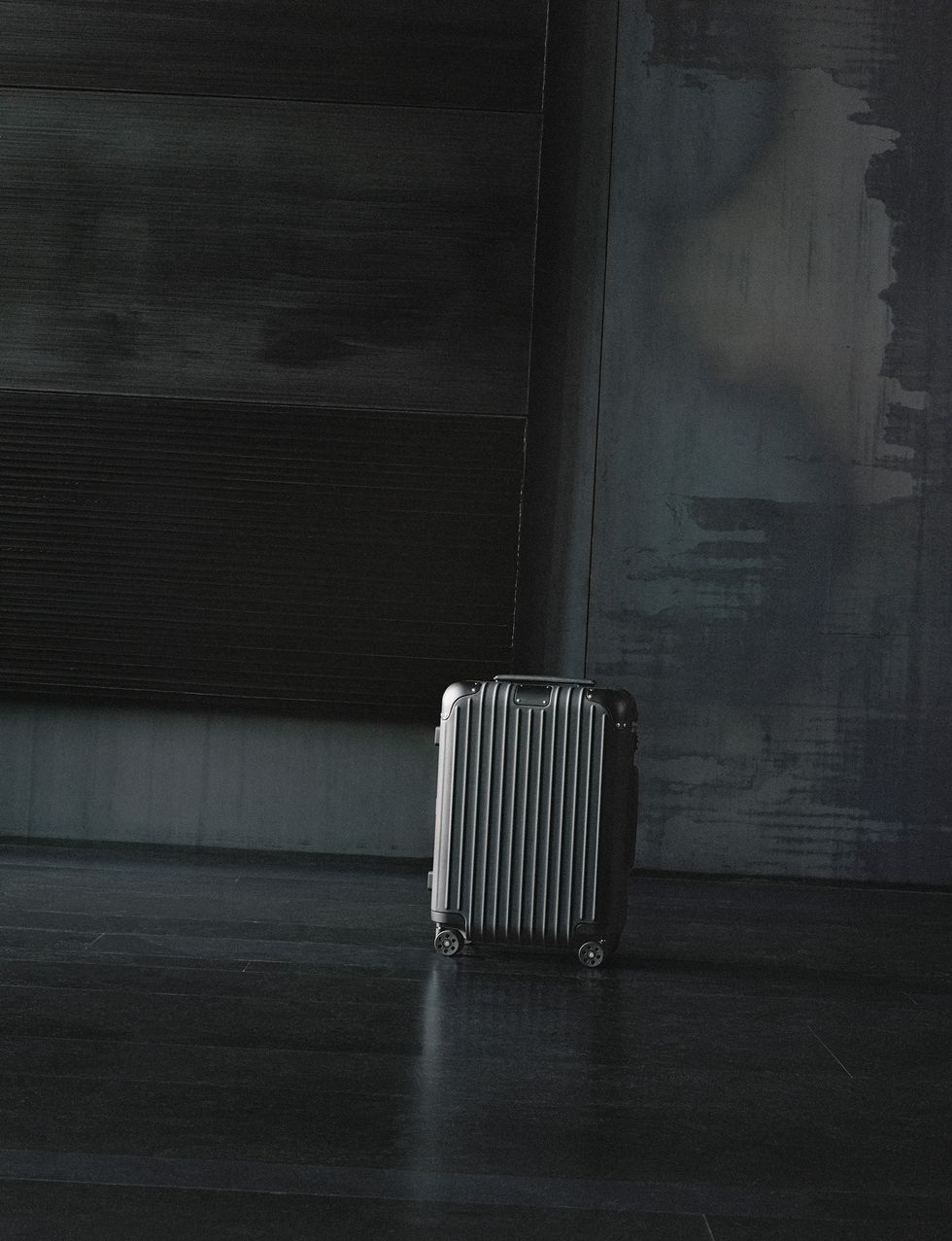 a suitcase in a dark room