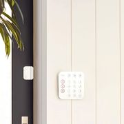 ring home security system keypad on side of home