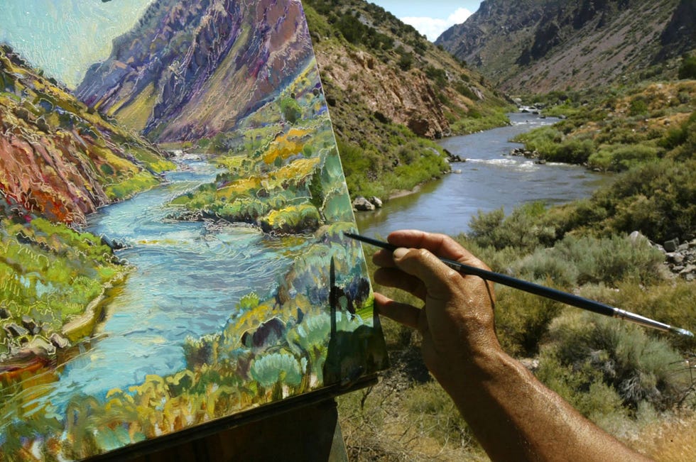 De schoonheid van de Rio Grande bij Ohkay Owingeh inspireert een kunstenaar tot het schilderen van een landschap