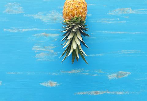 upside down pineapple on a blue background
