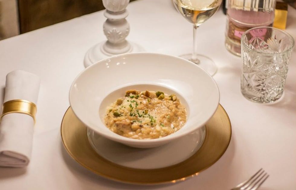 risotto cremoso de boletus y espárragos trigueros, plato del restaurante bodega de los secretos de madrid