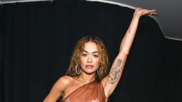 preview for Rita Ora wears gothic gown at Met Gala 2023