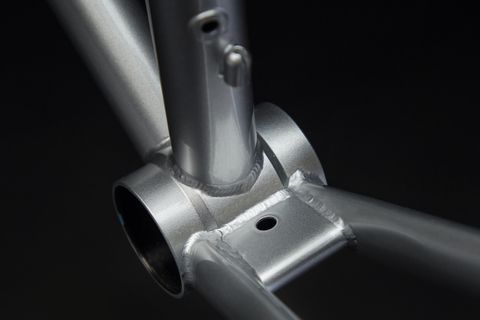 Metal, Bicycle frame, Titanium, Steel, Bicycle fork, Aluminium, Rim, Bicycle part, Carbon, Automotive exhaust, 