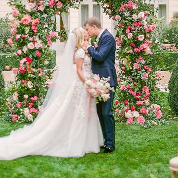 Photograph, Bride, Ceremony, Wedding dress, Pink, Floral design, Flower Arranging, Wedding, Dress, Marriage, 