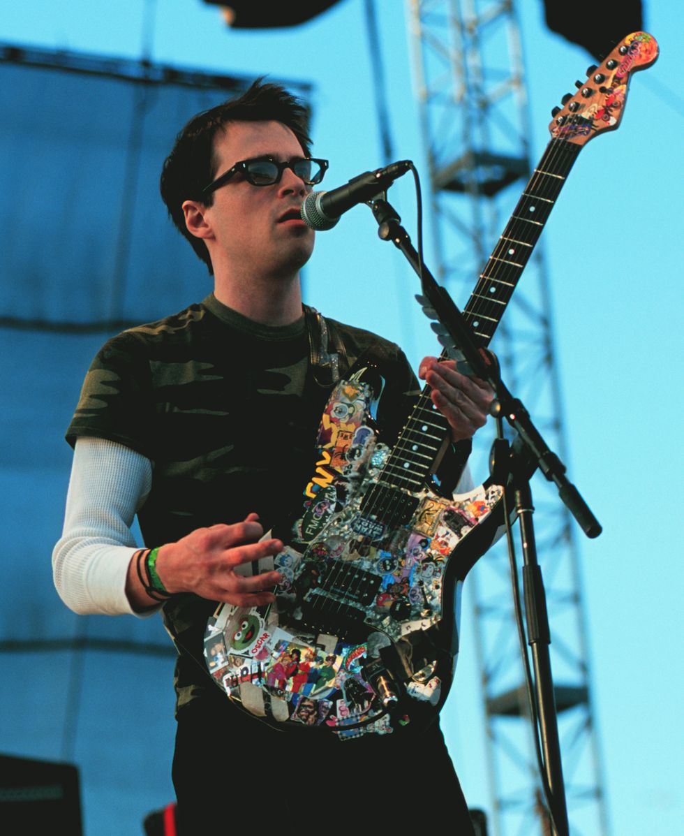 weezer performs at the coachella music festival 2001