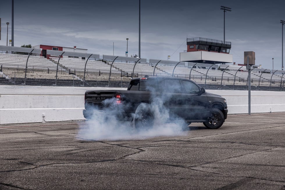 2026 ram 1500 black express with hemi v 8 burnout from the rear