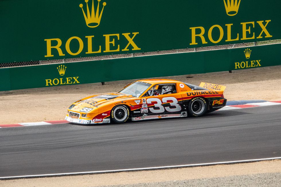 rolex monterey motorsports reunion 2023 orange camaro body