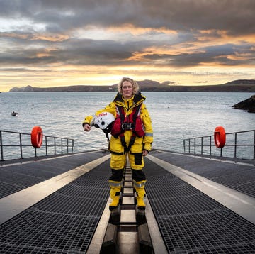 a portrait of rnli st davids volunteer lifeboat crew member emma lockett stood on the slipway