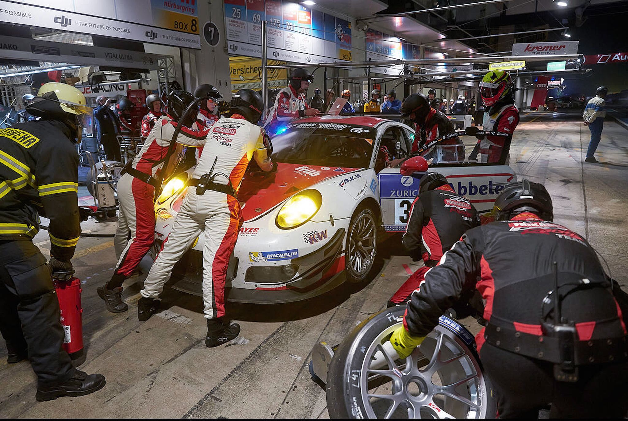 g2ec07 nuerburg, germany 29th may, 2016 the posrsche 991 gt3r of team frikadelli racing with sabine schmitz, klaus abbelen, patrick huismann and norbert siedler during a pit stop during the 24h race at nuerburgring in nuerburg, germany, 29 may 2016 photo thomas freydpaalamy live news