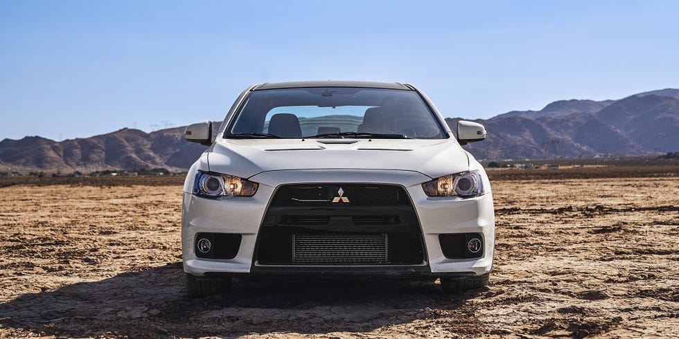 Land vehicle, Vehicle, Car, Mitsubishi, Automotive design, Mitsubishi lancer, Mitsubishi lancer evolution, Bumper, Sports car, Hood, 