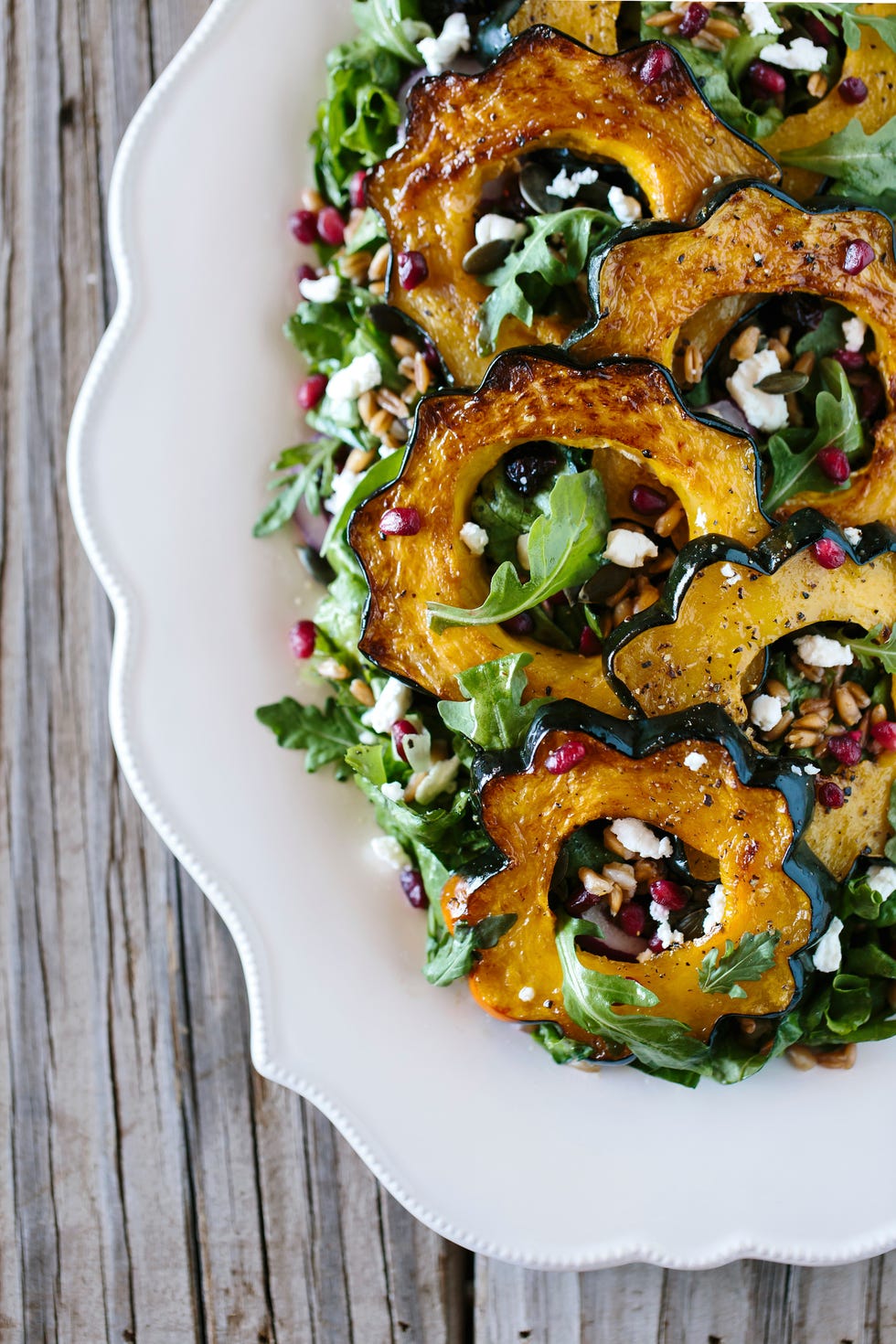 Roasted Acorn Squash Salad with Spicy Pepitas and Cranberries