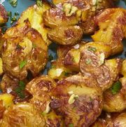 thanksgiving sides crispy smashed potatoes with fresh herbs