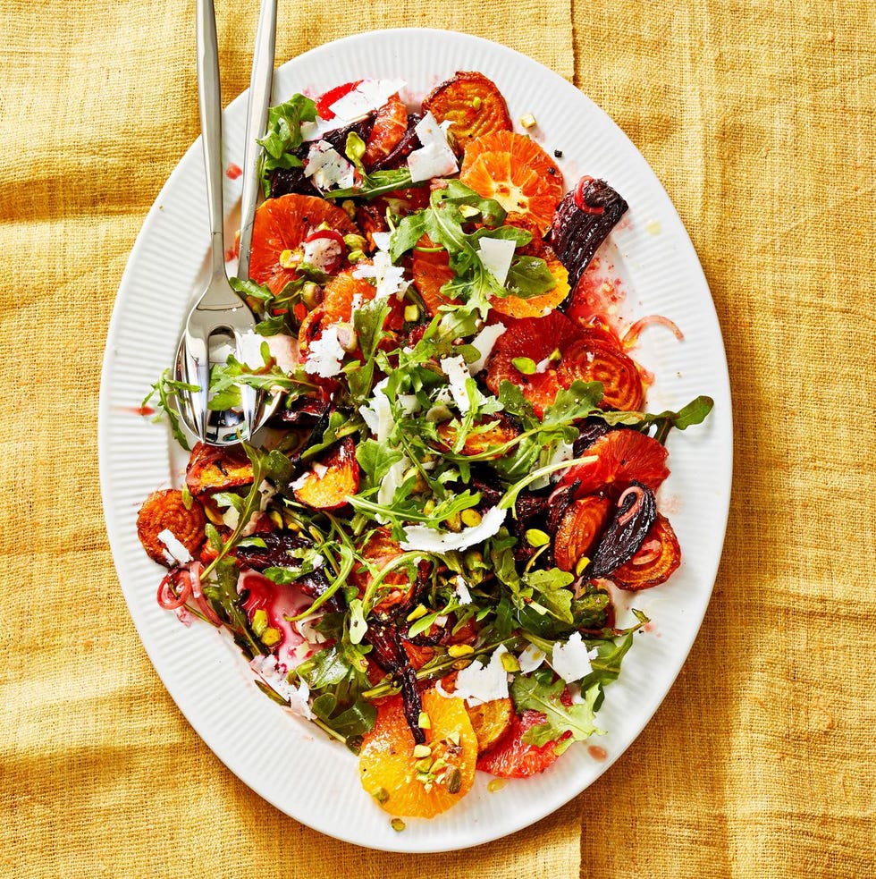 beet and orange salad on a white plate