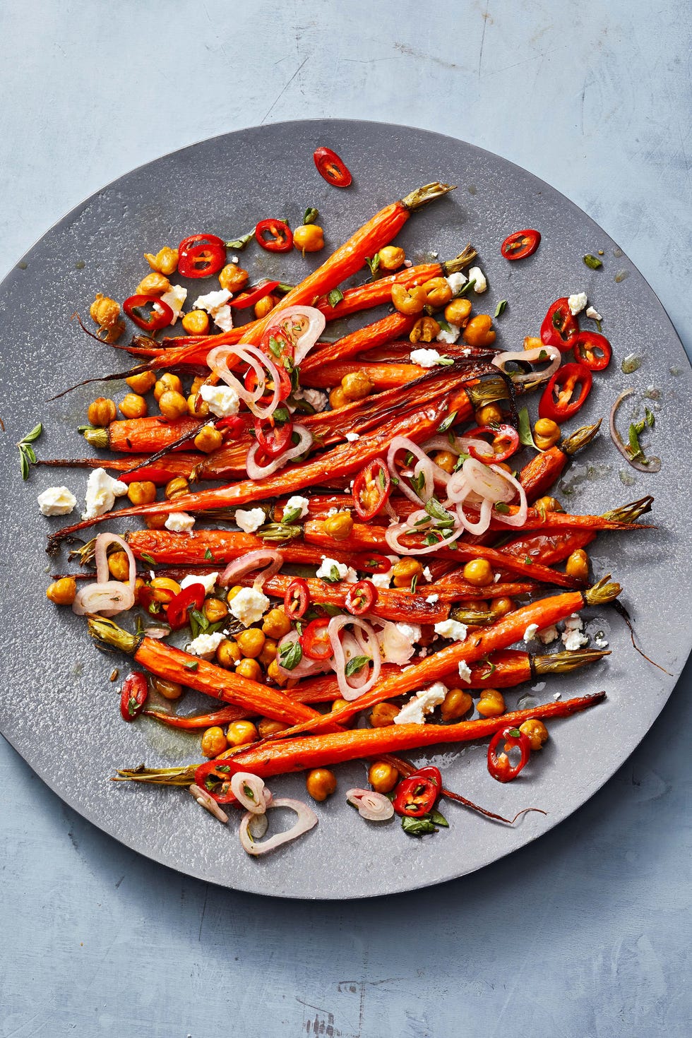 Roasted Carrots and Chickpeas With Marinated Feta roasted carrots and chickpeas with marinated feta on a plate