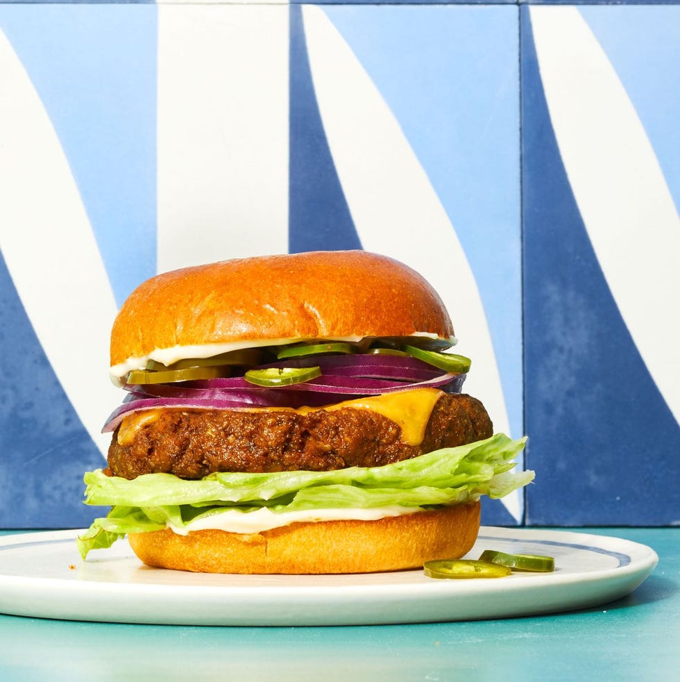 roasted eggplant veggie burgers with red onion, cheese, pickles and lettuce