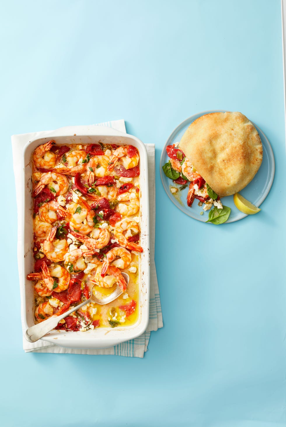 roasted garlicky shrimp in a white baking dish