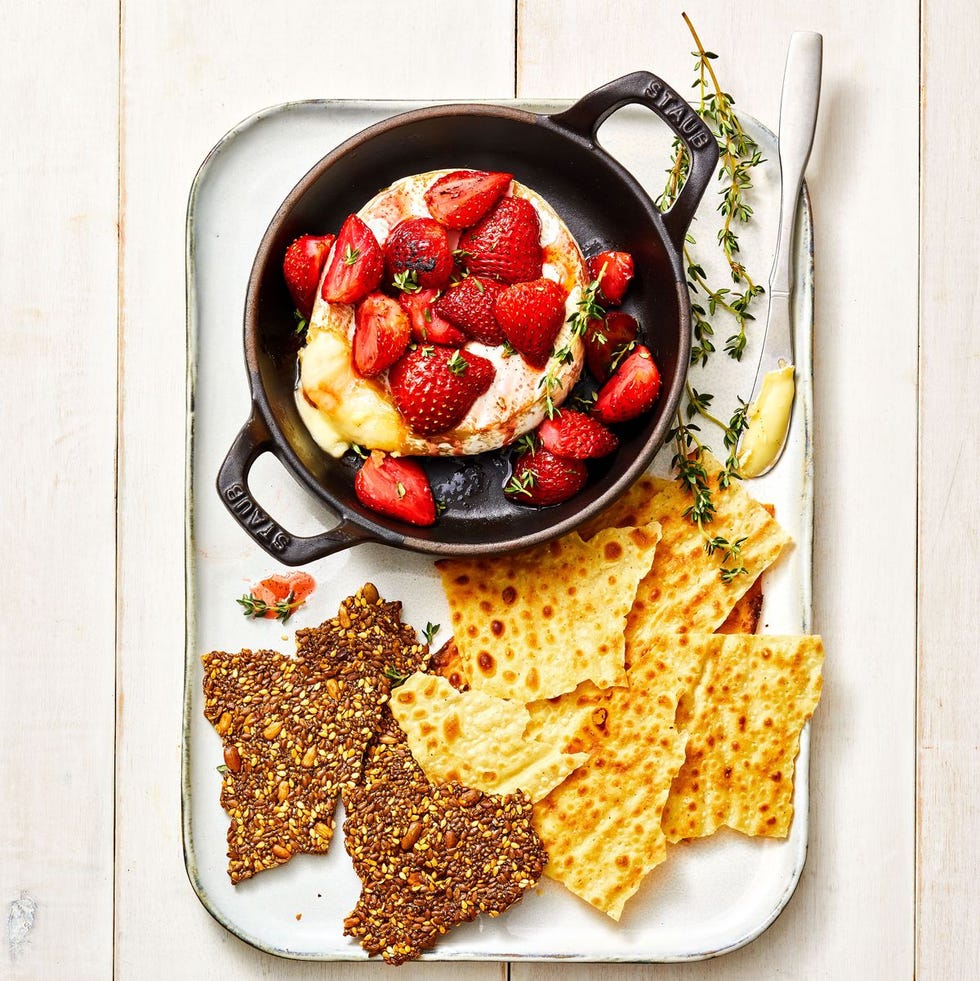 roasted strawberries and brie in a cast iron pan