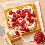 strawberry tart with whipped cream on puff pastry