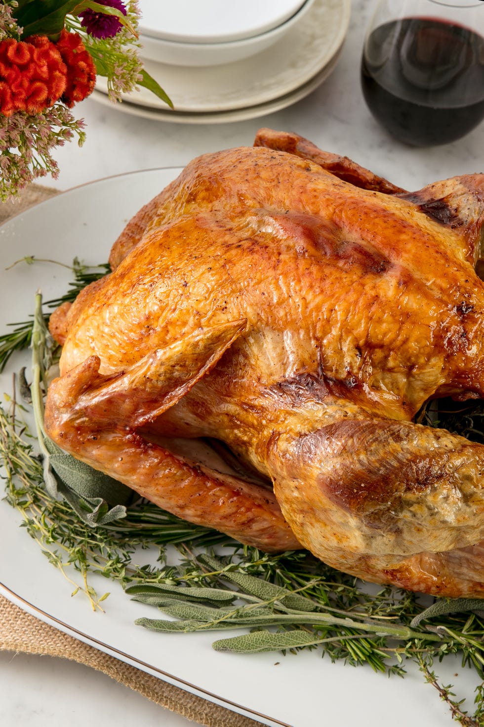 https://hips.hearstapps.com/hmg-prod/images/roasted-turkey-vertical-1542315882.jpg?crop=1xw:1xh;center,top&resize=980:*