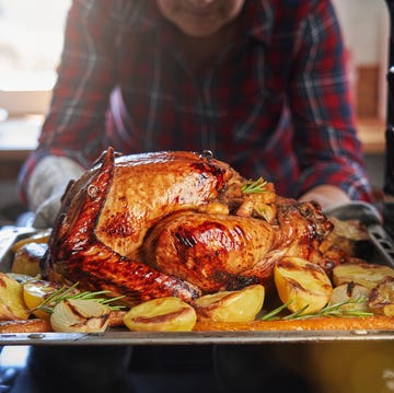 Roasting Turkey in the Oven for Holiday Dinner roasting turkey in the oven for holiday dinner