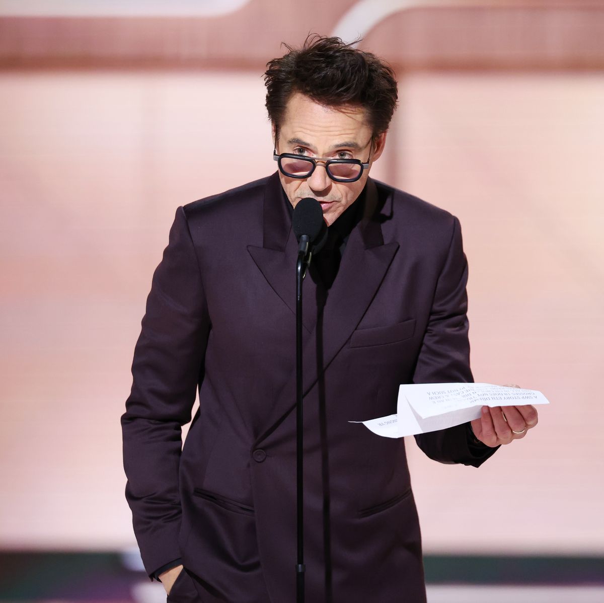https://hips.hearstapps.com/hmg-prod/images/robert-downey-jr-accepts-the-award-for-best-performance-by-news-photo-1704678431.jpg?crop=0.701xw:1.00xh;0.165xw,0&resize=1200:*