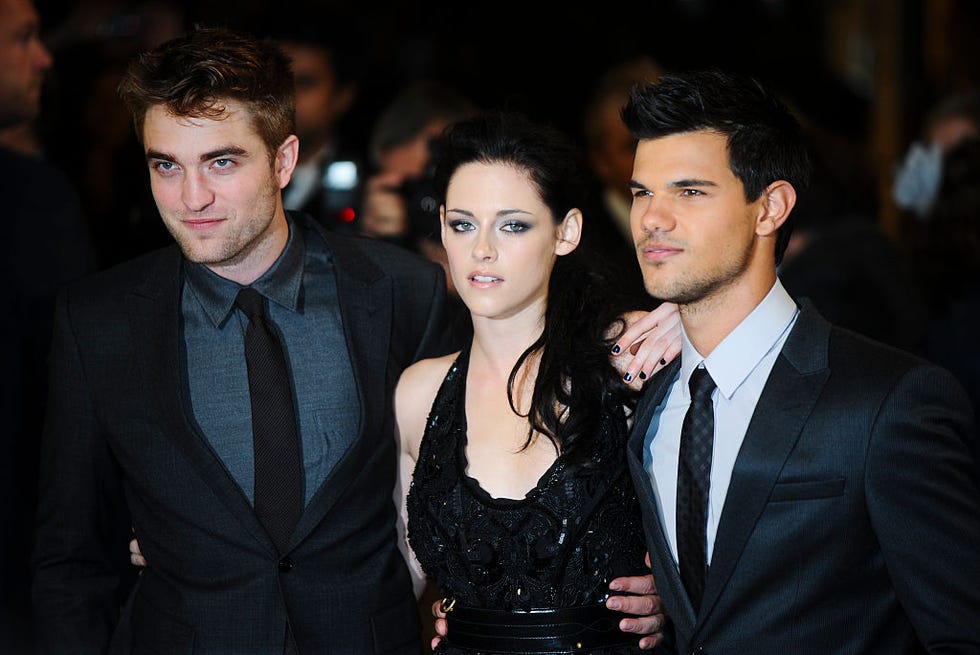 robert pattinson, kristen stewart and taylor lautner attend the uk premiere of the twilight saga breaking dawn part 1 at westfield stratford city on november 16, 2011 in london