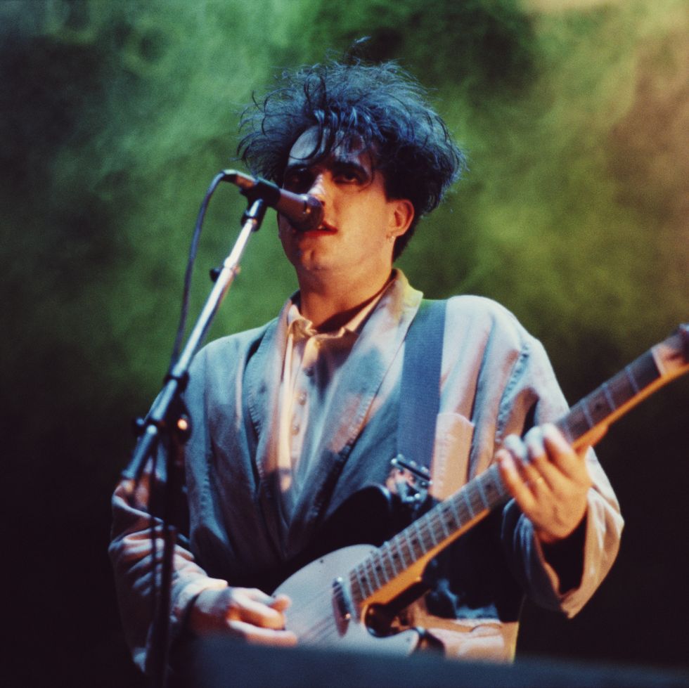 robert smith of the cure performs on stage, brazil, march 1987. (photo by michael putland/getty images)
